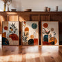 boho botanical wall art set with geometric shapes in terracotta and dark green above sofa
