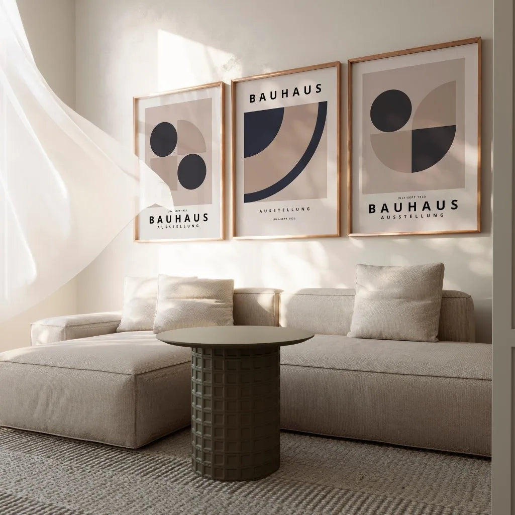 neutral geometric bauhaus poster set in modern office workspace