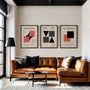 red and black geometric bauhaus poster set in contemporary office workspace