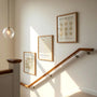 beige bauhaus poster set arranged in refined modern gallery wall