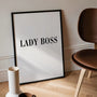 typography posters arranged in modern black and white gallery wall