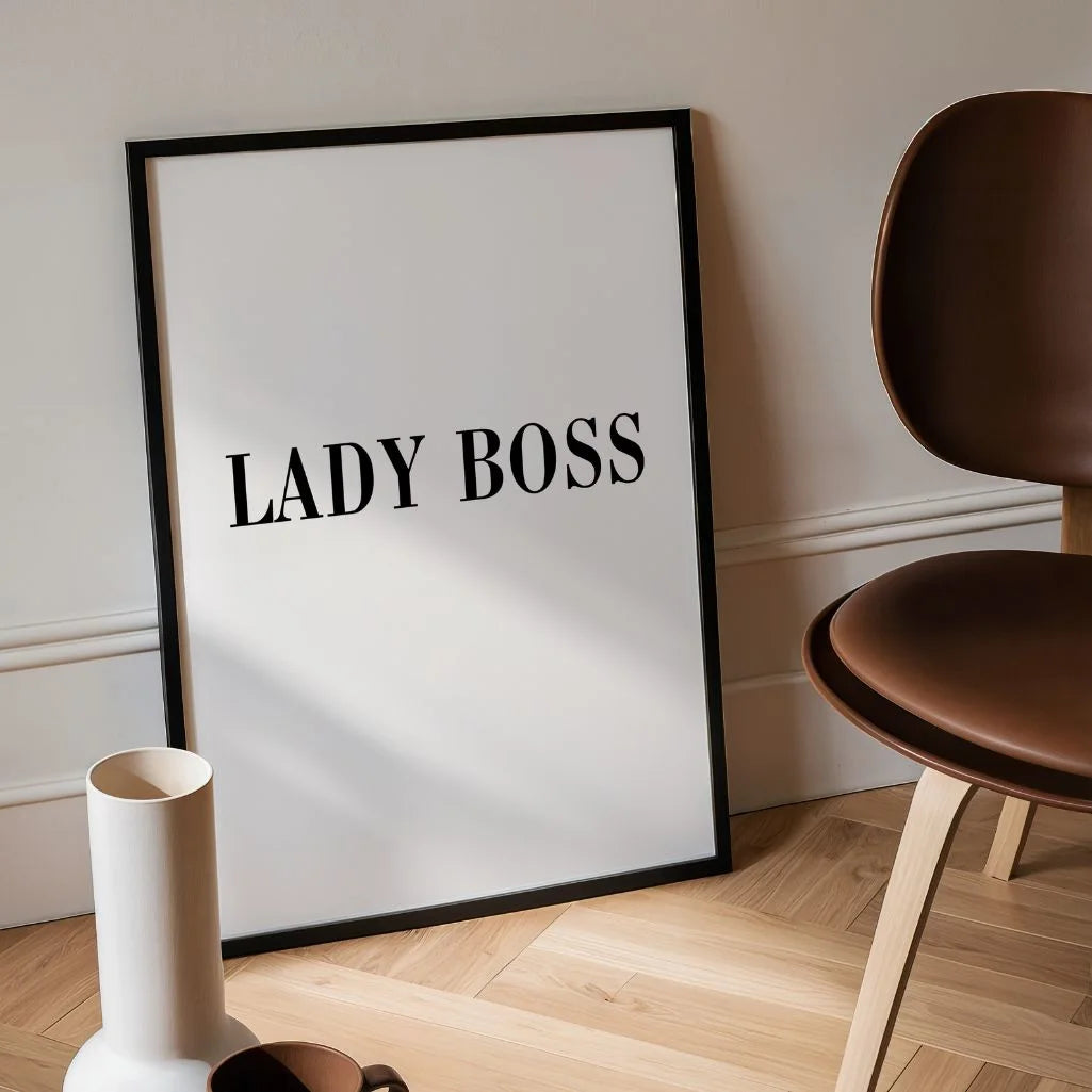 typography posters arranged in modern black and white gallery wall