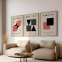 red and black bauhaus poster set arranged in modern gallery wall