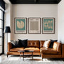 sage green geometric bauhaus poster set with dotted grid and arcs in office workspace