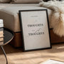 minimalist marble quote poster in calm bedroom interior