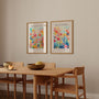 Set of 2 floral watercolor posters displayed as gallery wall in modern interior